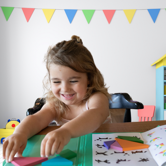 Tangram puzzle set perfect for the traveling family with  preschoolers. Magnetic pieces make it perfect for busy toddlers at the restaurant or on the road! Fun Learn Grow Co.