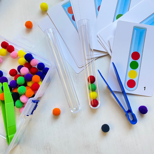 Match the pom poms with the picture. Grab the pom poms with the tweezers and place into a test tube. Great for building fine motor skills, spatial reasoning, and learning colors. Fun Learn Grow Co.