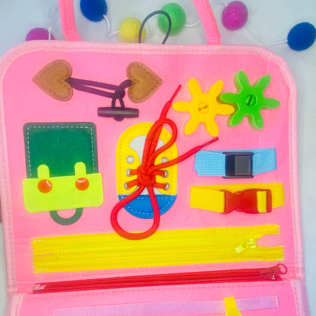 toddler sensory busy book for traveling fun, learn how to buckle, button, snap, and zipper for toddlers! Fun Learn Grow Co.