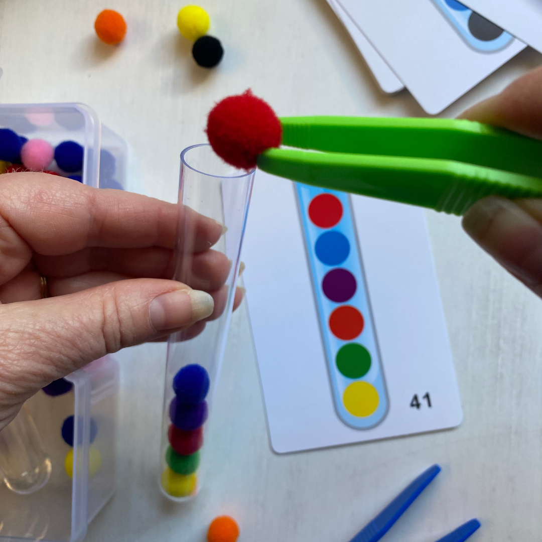 Match the pom poms with the picture. Grab the pom poms with the tweezers and place into a test tube. Great for building fine motor skills, spatial reasoning, and learning colors. Fun Learn Grow Co.